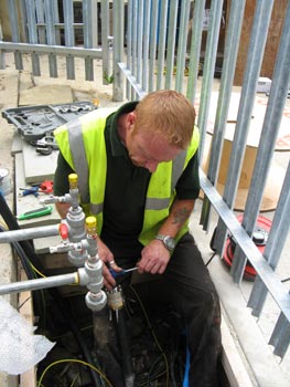 Man performing maintenance Man performing maintenance